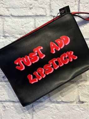 NWT Victoria’s Secret black faux leather cosmetic bag (7x9.5)